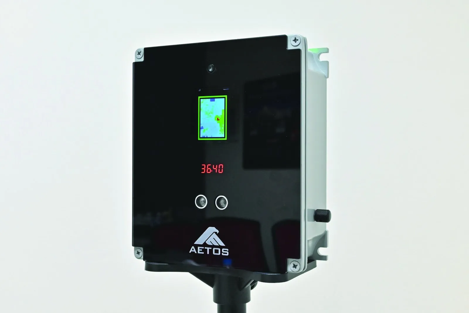AETOS KoolScan contactless temperature scanner displaying a live reading