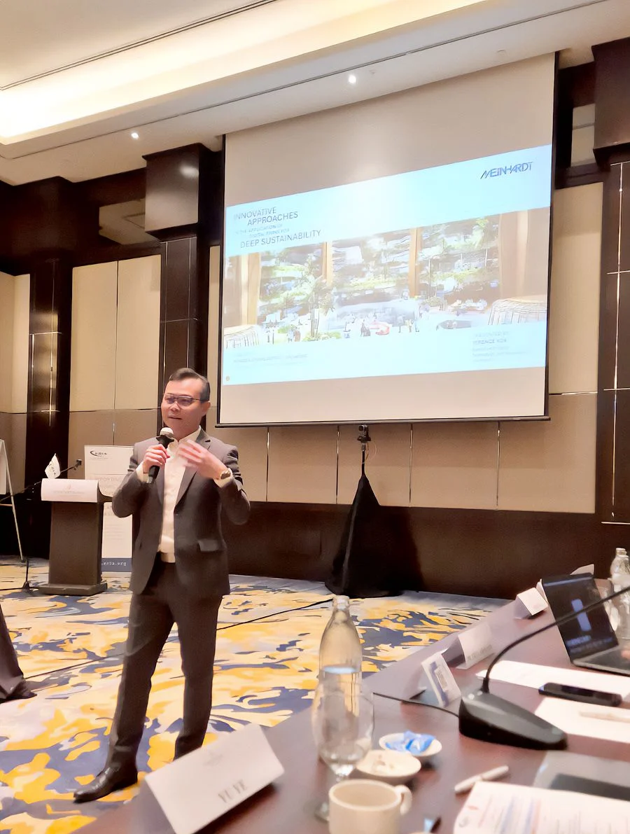 Terence Kok presenting on digital twin innovations at ASEAN Sustainable Urbanisation Forum 2025, ERIA, Kuala Lumpur